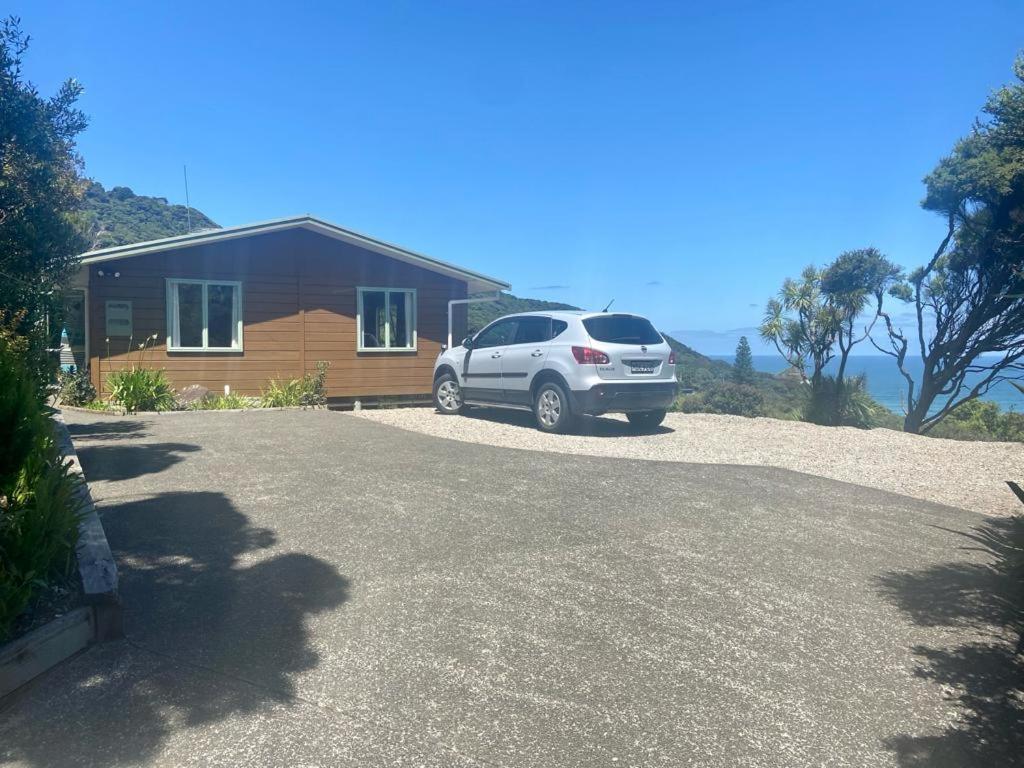 Seaview, Sun And Surf - Piha Holiday Home Exterior photo